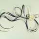 Blauwe corsage met linten