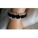 Armband met roosjes en kralen zwart 